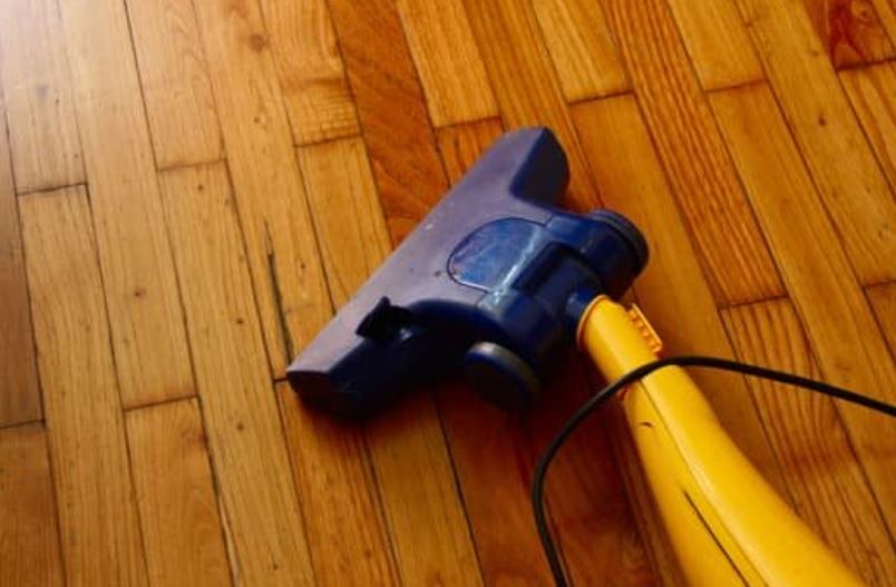 Clean engineered hardwood floors daily.
